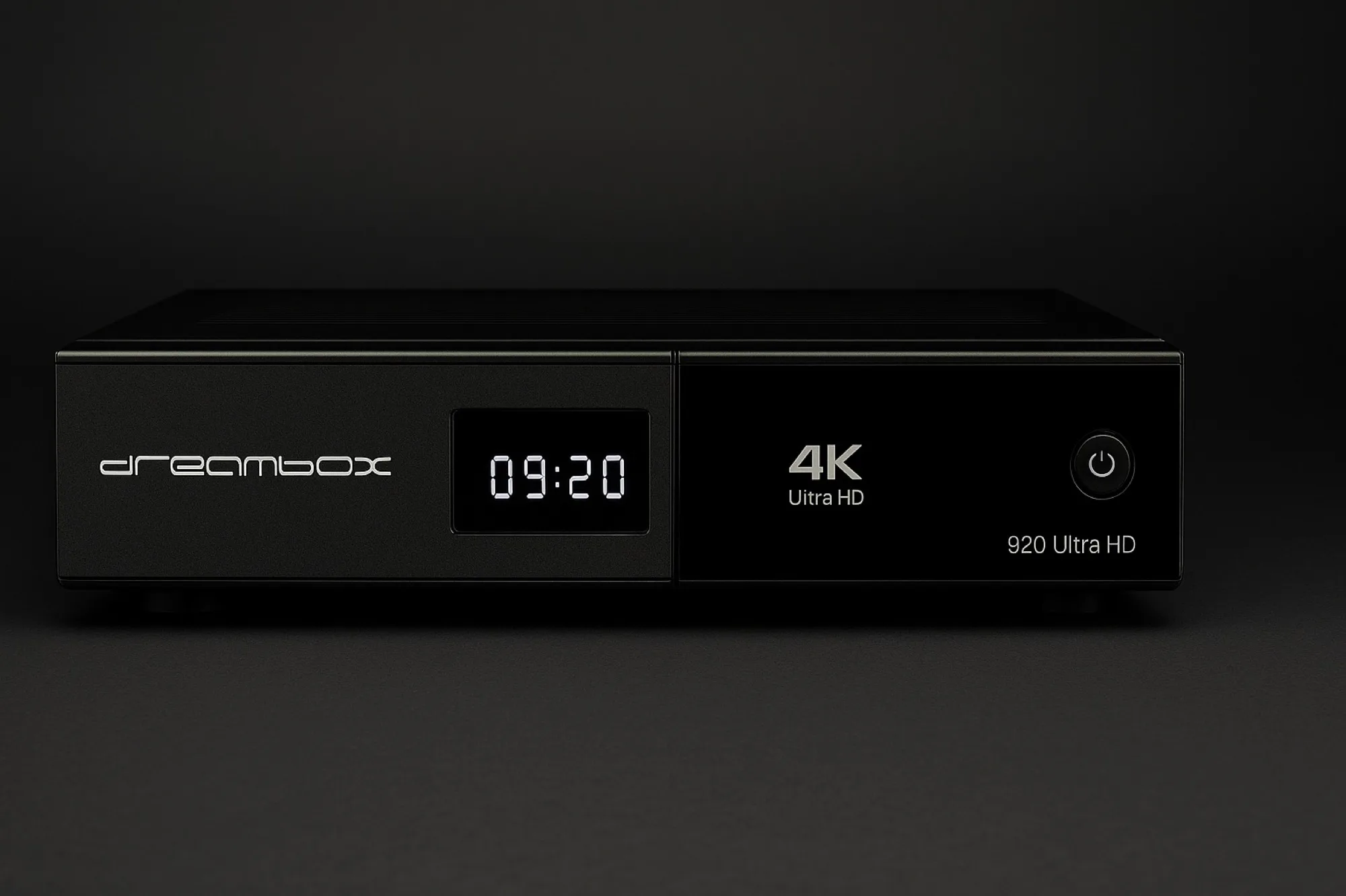 Dreambox 920 Ultra HD receiver – front view with digital clock, 4K Ultra HD logo, and matte black finish, ideal for satellite TV