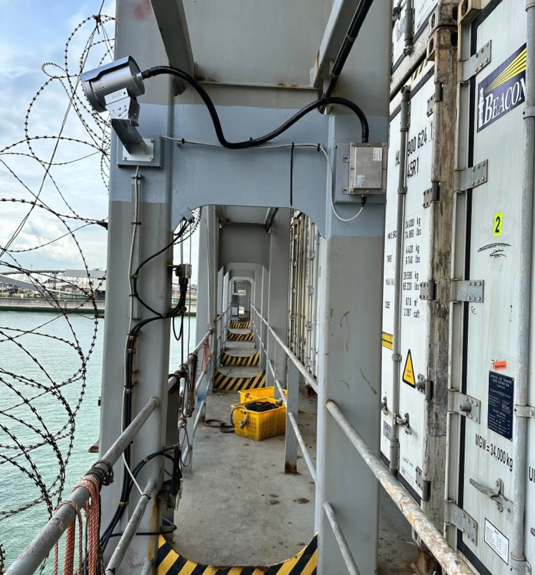 Ship interior monitored by onboard marine surveillance system with real-time alerts