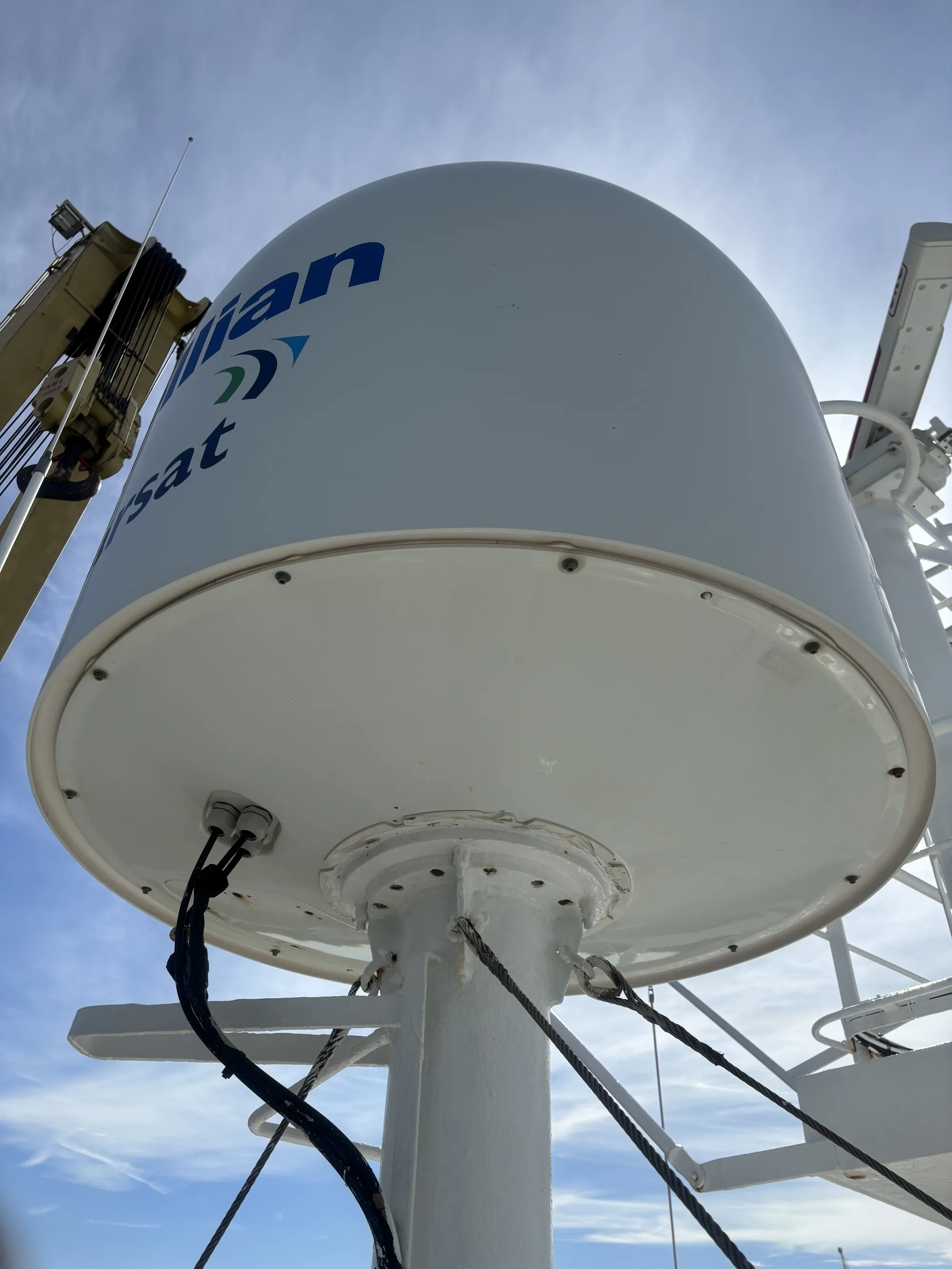 Intellian GX100 radome and mast bracket seen from below