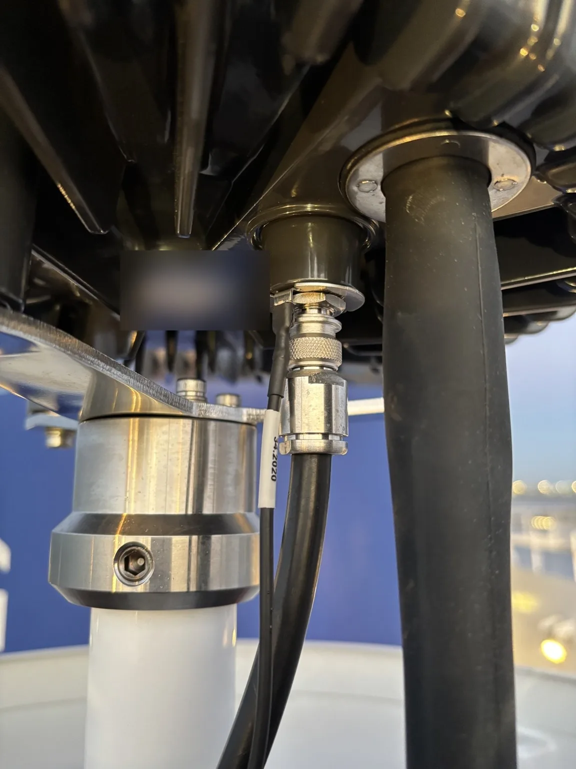 Iridium Certus antenna cable connector and pole mount after replacement