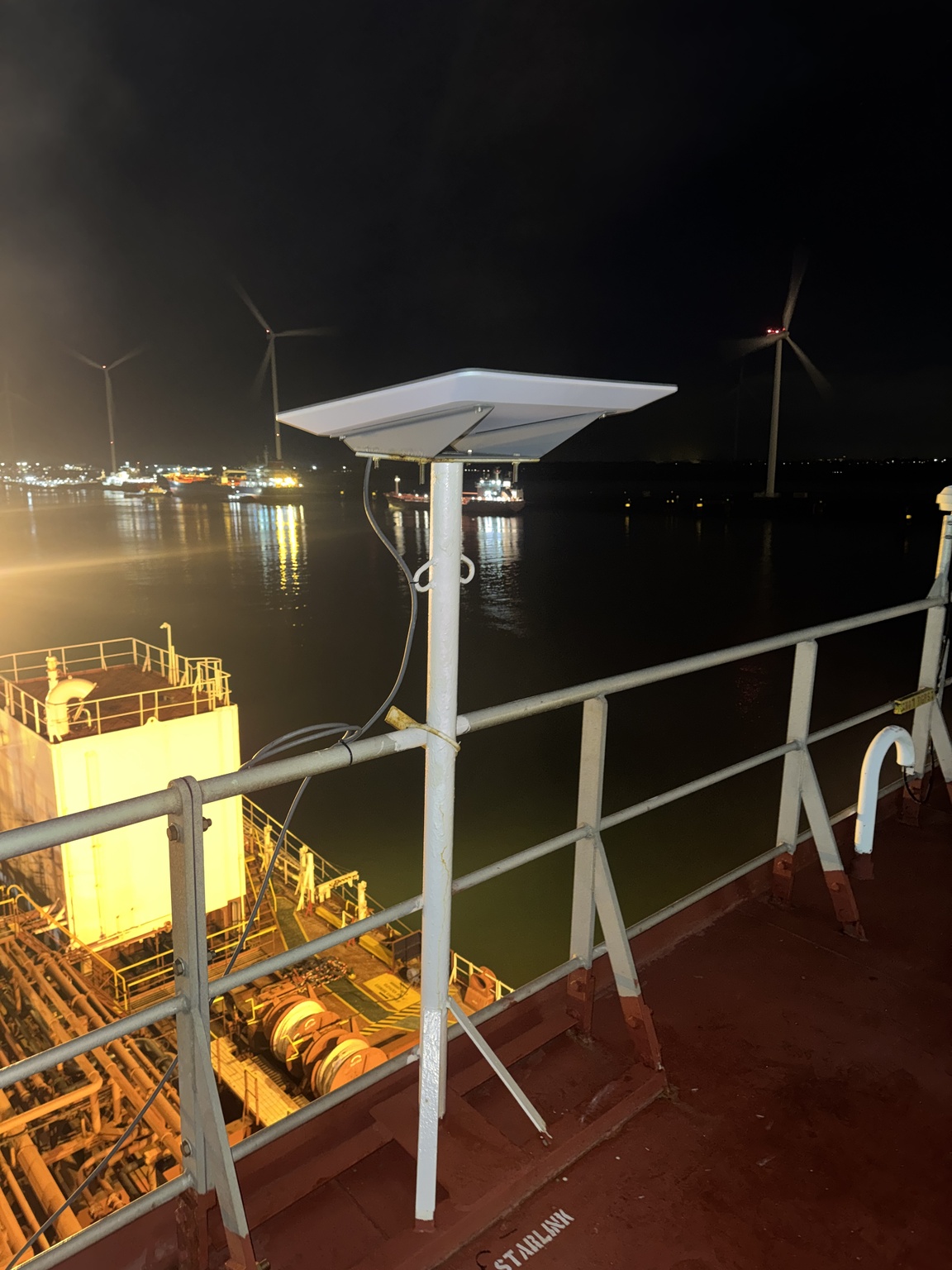 Starlink maritime installation satellite antenna on cargo ship at sea